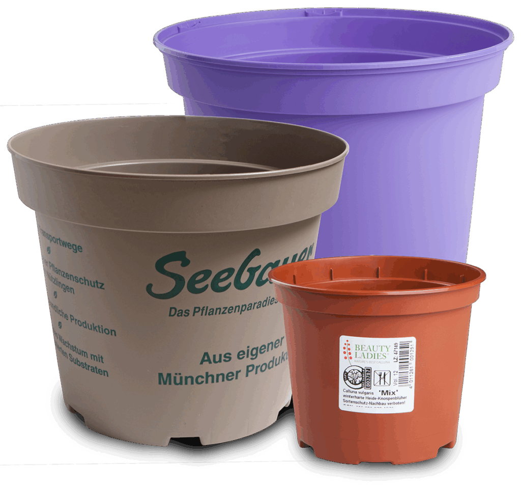Three colorful plastic flower pots in different sizes.